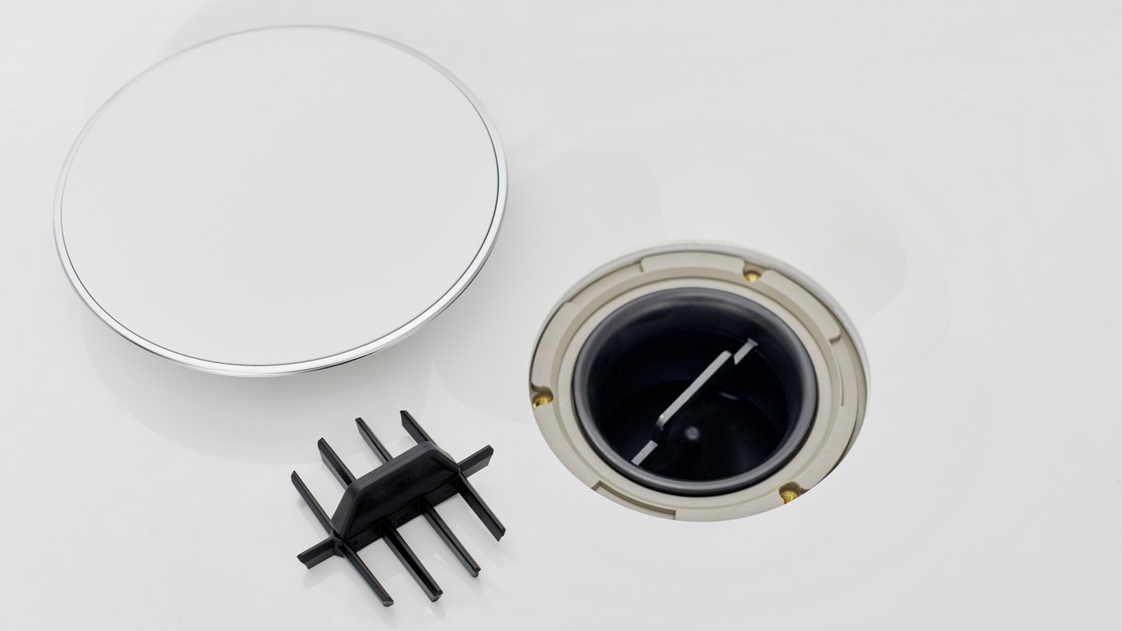 Avløpsdeksel og hårsil