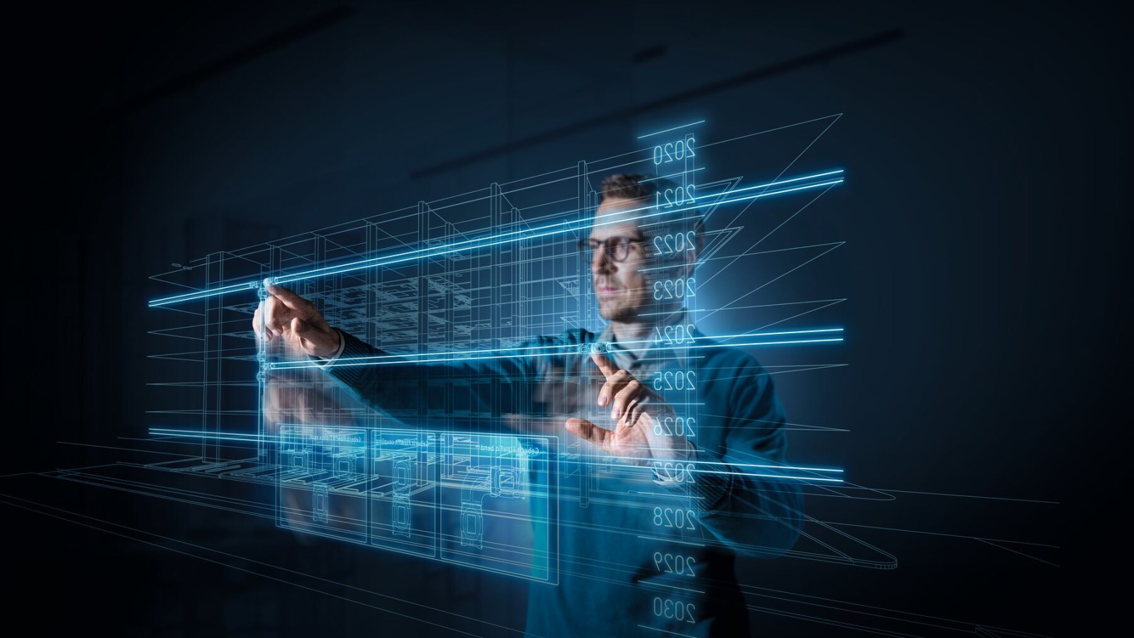 En planlegger foran en skjerm En planlegger foran en skjerm