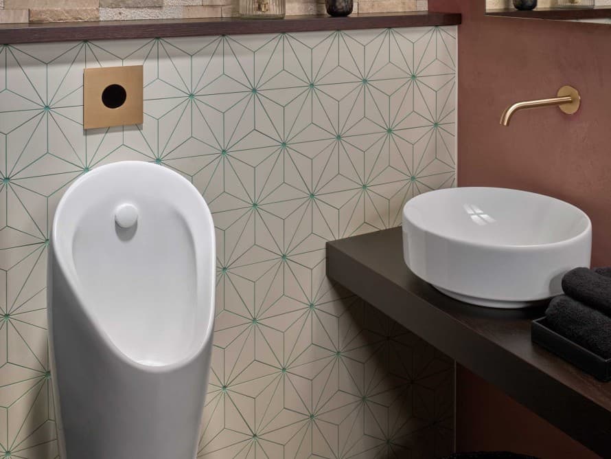 Dekkplate type 40 for urinal med berøringsfri skyllaktivering er tilpasset servantarmaturer fra ledende leverandører og gir et stilrent uttrykk. Dekkplate type 40 for urinal med berøringsfri skyllaktivering er tilpasset servantarmaturer fra ledende leverandører og gir et stilrent uttrykk.