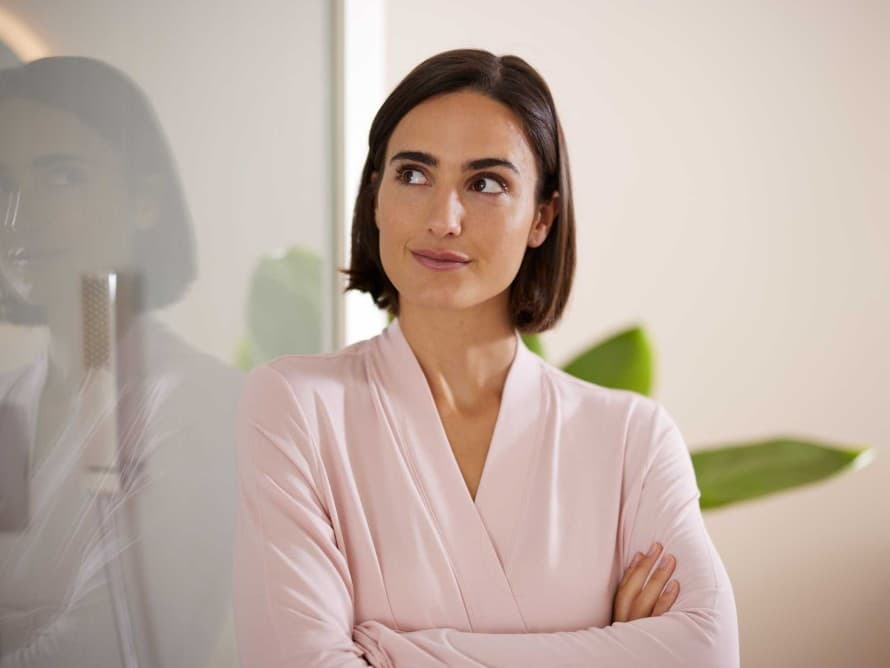 Woman in a bathroom from Geberit Woman in a bathroom from Geberit