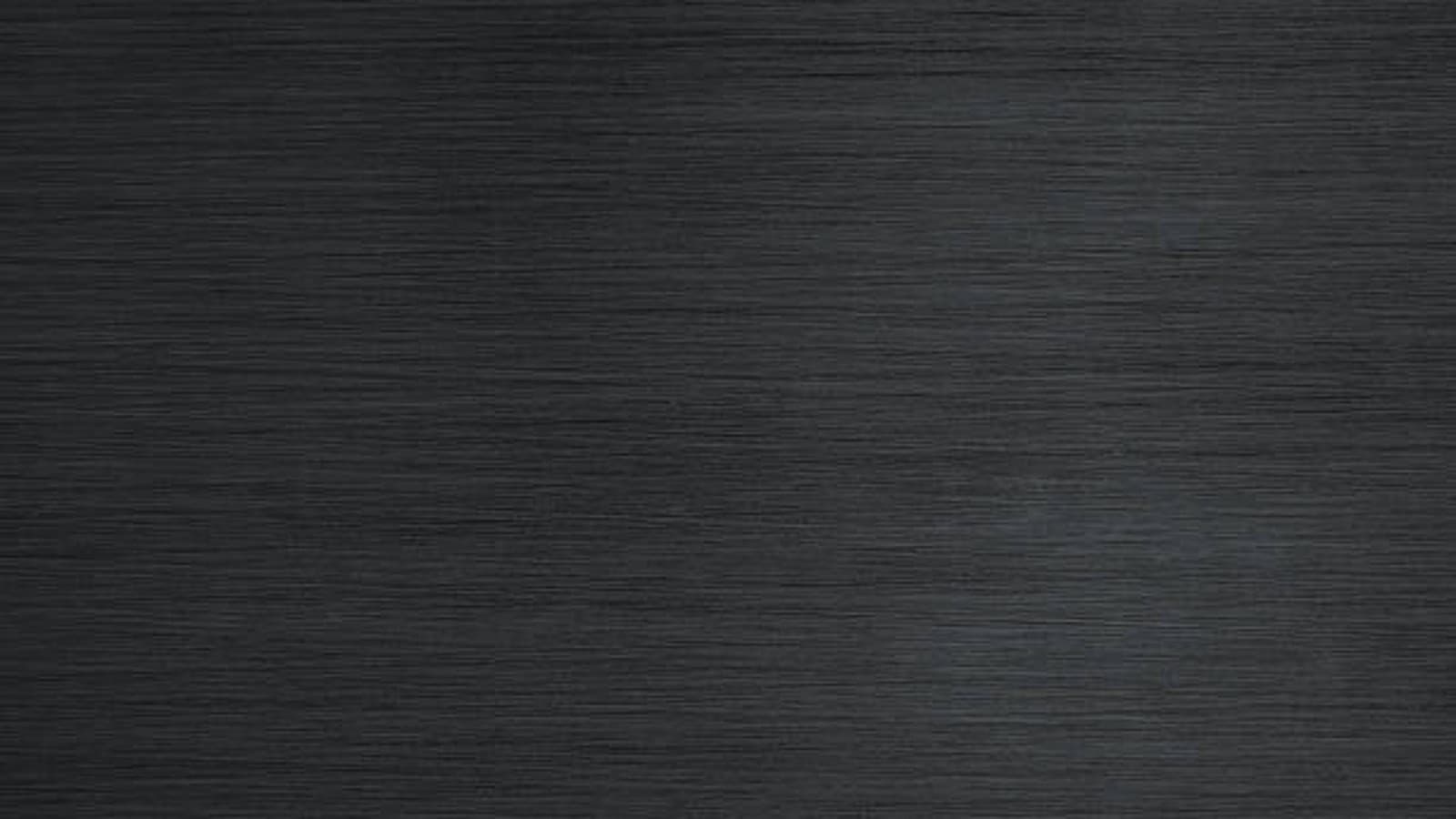 Monolith sidekledning i sort børstet aluminium